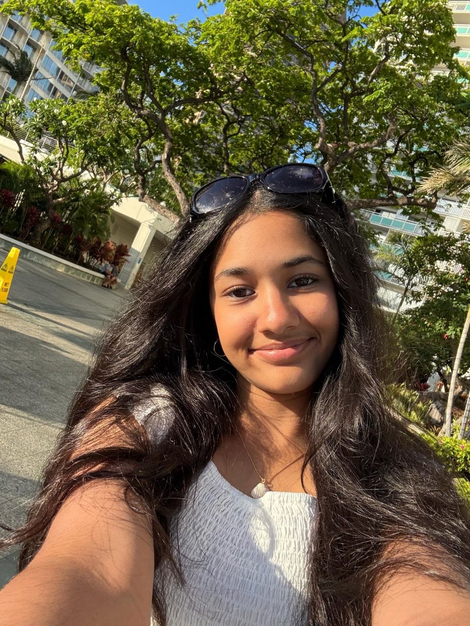 Portrait of Amulya Kuntamukkala outdoors.